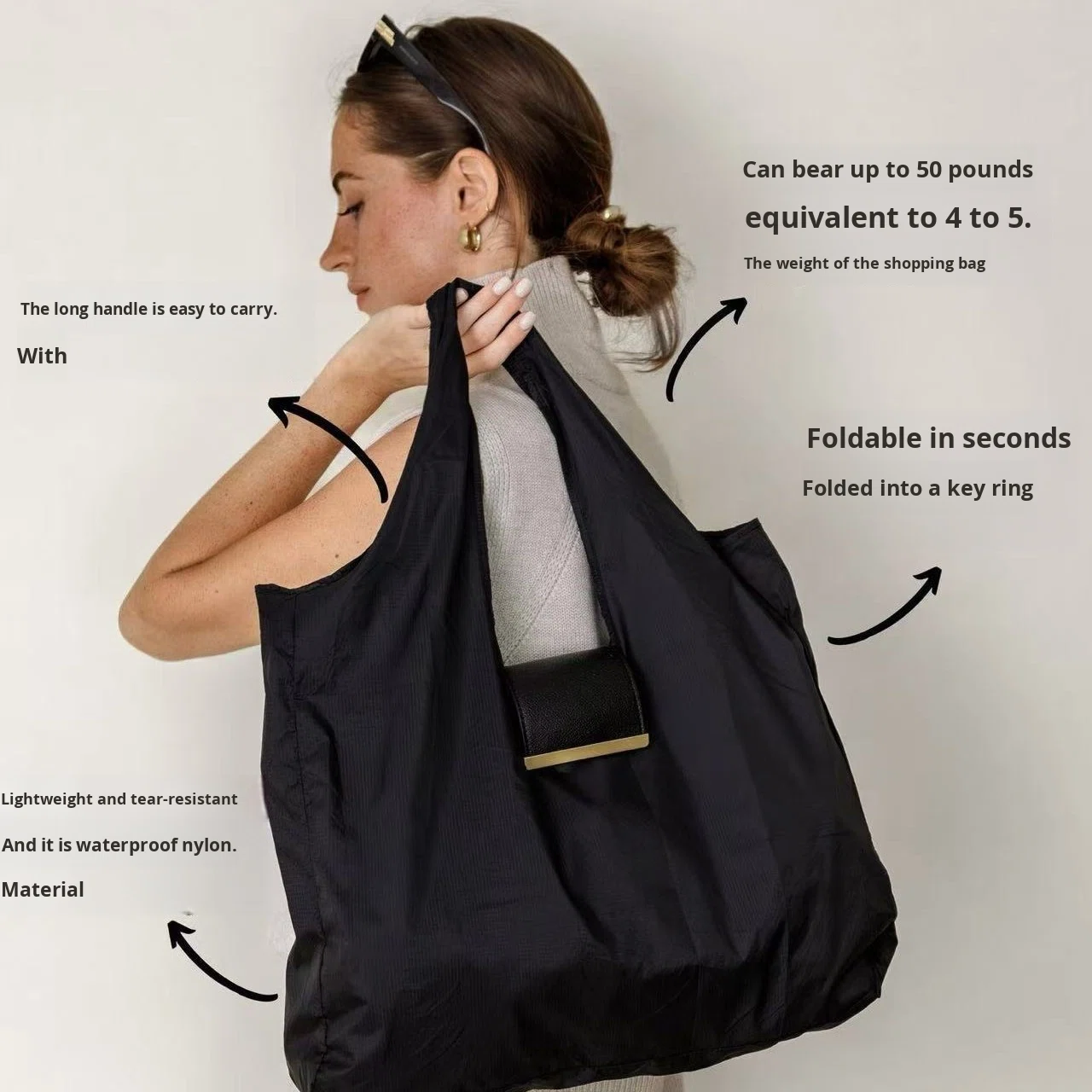 Foldable keychain tote bag WH-F266522 in compact folded pouch with clip-on design