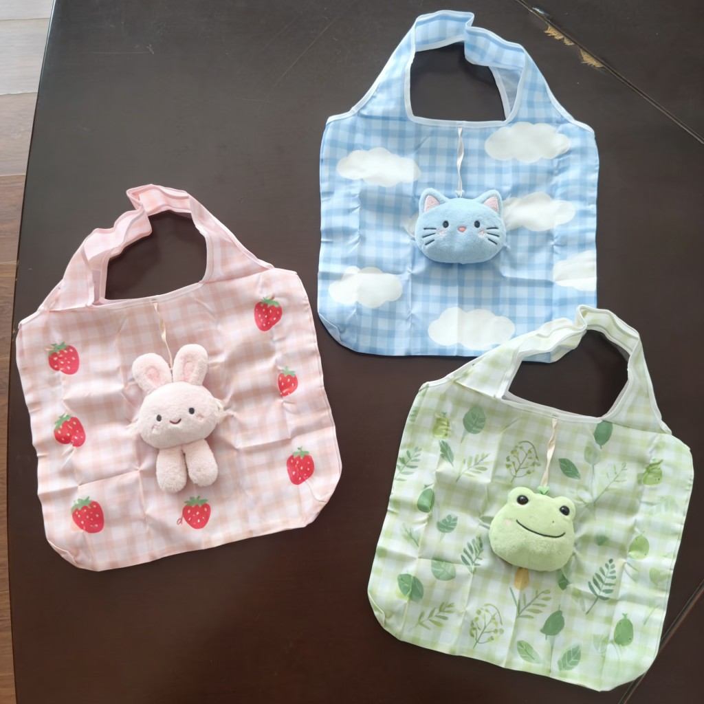 Plush doll shopping tote character detail soft plush material close up