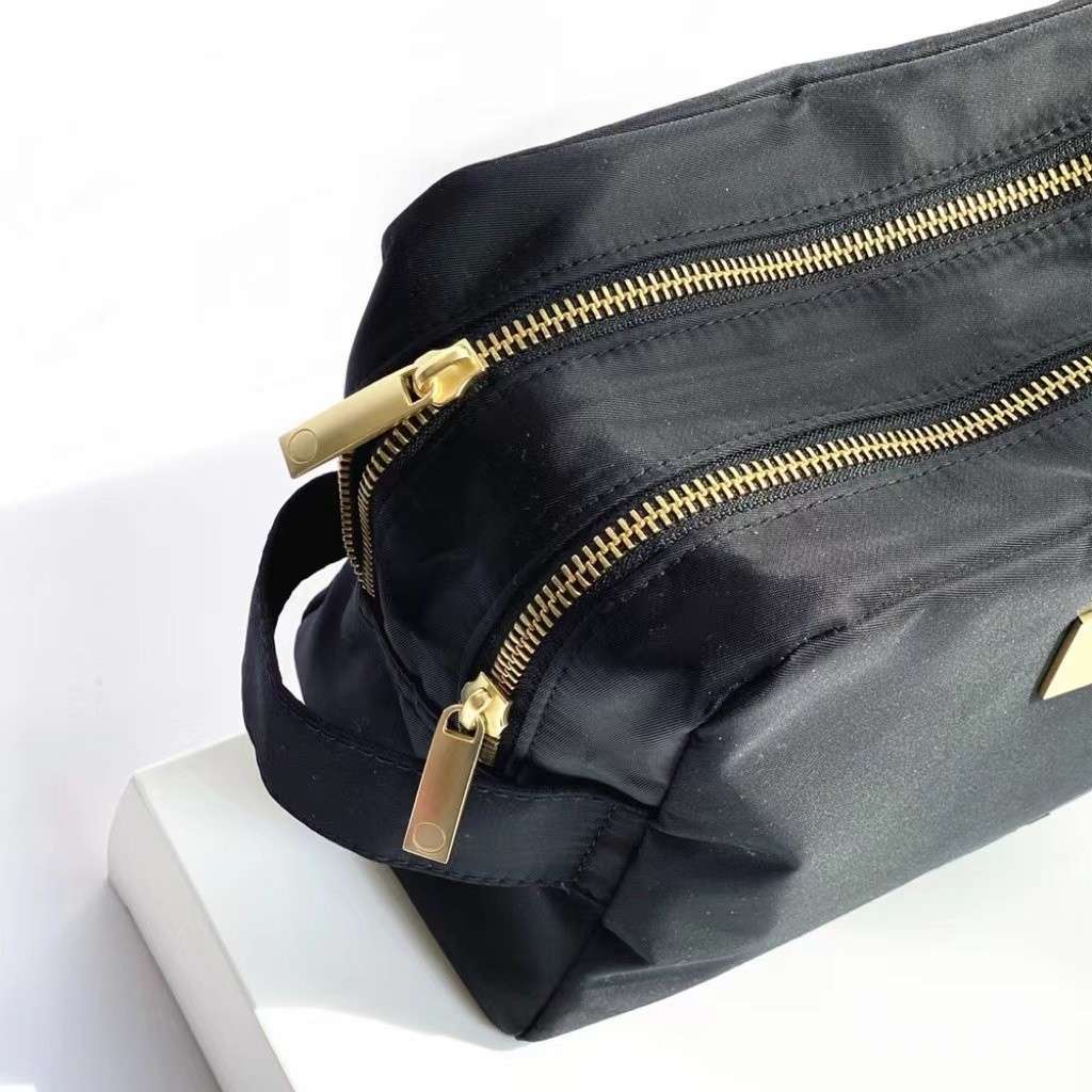 Portable travel makeup bag in water-resistant nylon material
