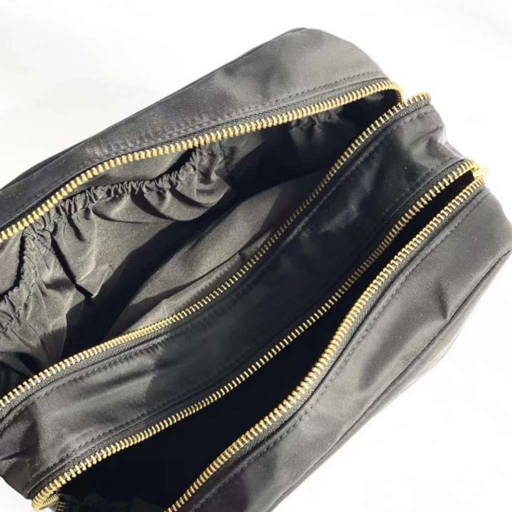 Custom embroidered nylon makeup bag interior zipper detail