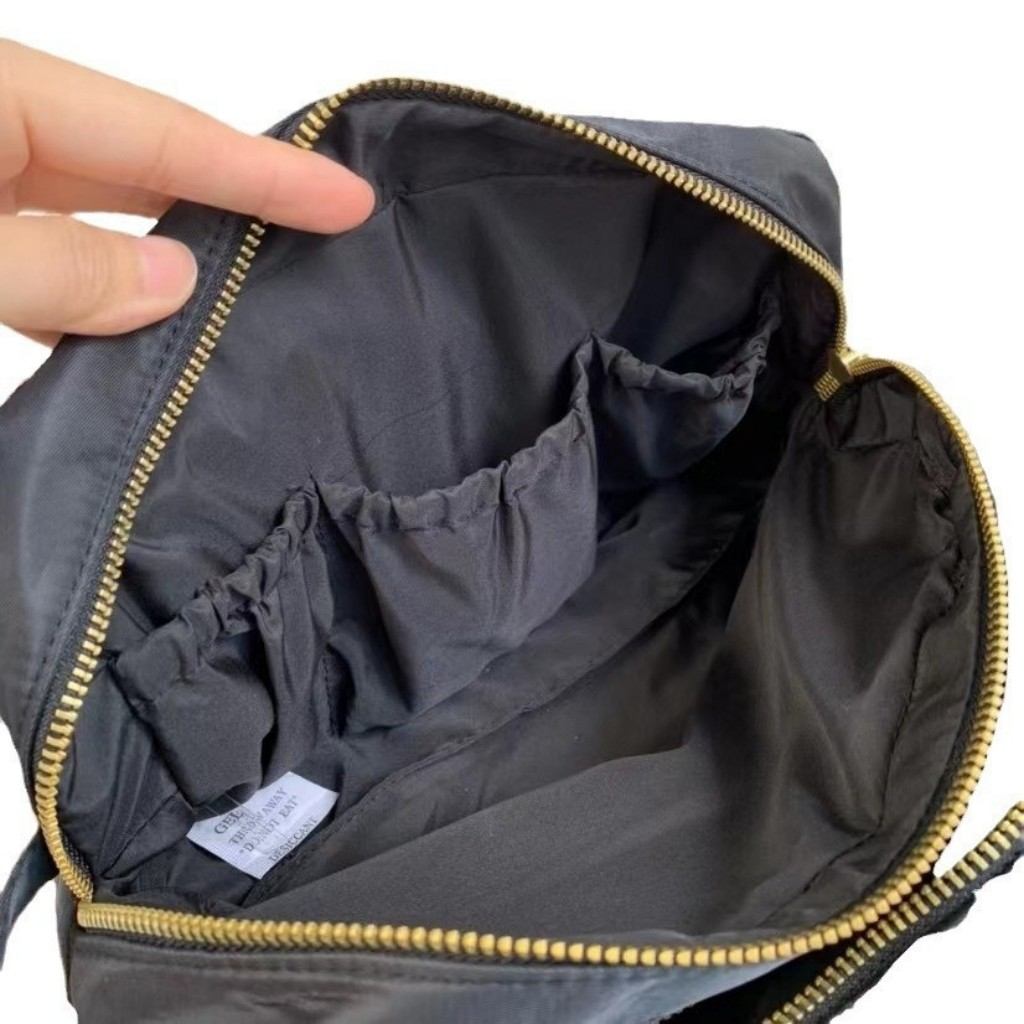 Water-resistant nylon cosmetic organizer bag with handle